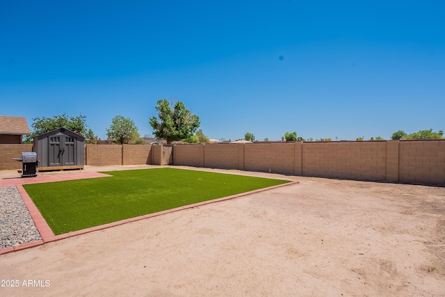 215 S 132nd St, Chandler, AZ 85225 - fenced backyard with a storage unit and a patio area