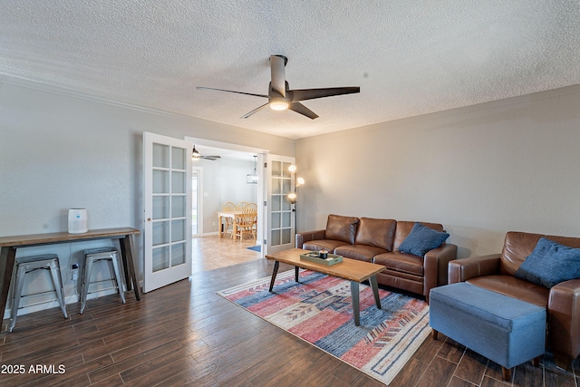 215 S 132nd St, Chandler, AZ 85225 - living room featuring a ceiling fan, a textured ceiling, wood finished floors, french doors, and crown molding