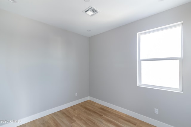 empty room featuring light hardwood / wood-style floors