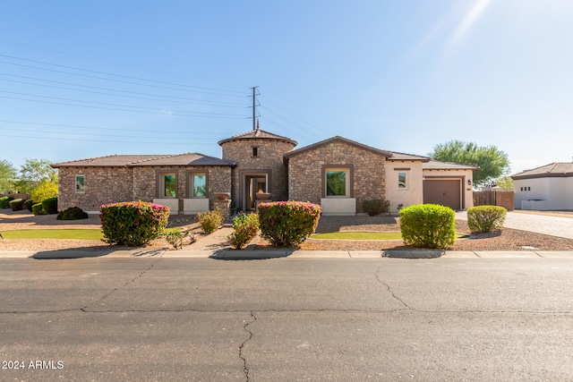 view of front of property featuring a garage