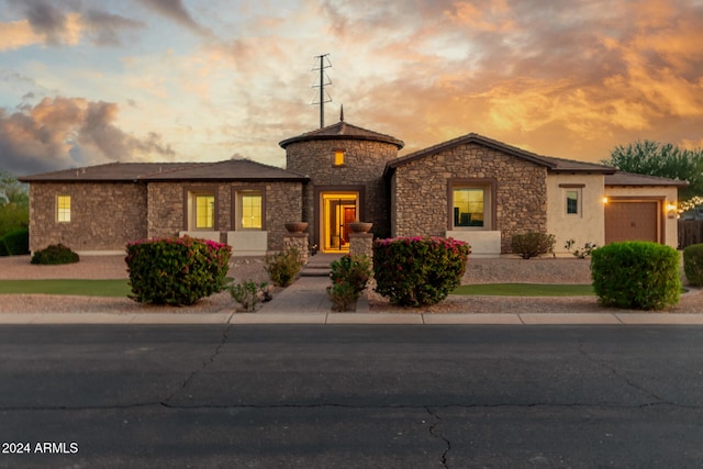 view of front of home with a garage