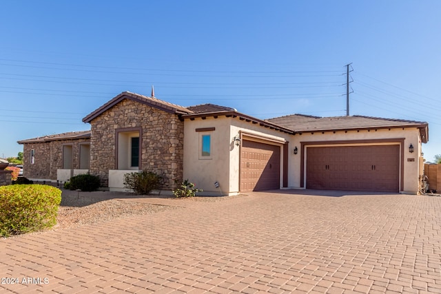 view of front of home featuring a garage