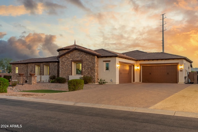 prairie-style house featuring a garage