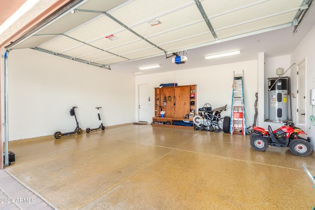 garage featuring a garage door opener and heat pump water heater