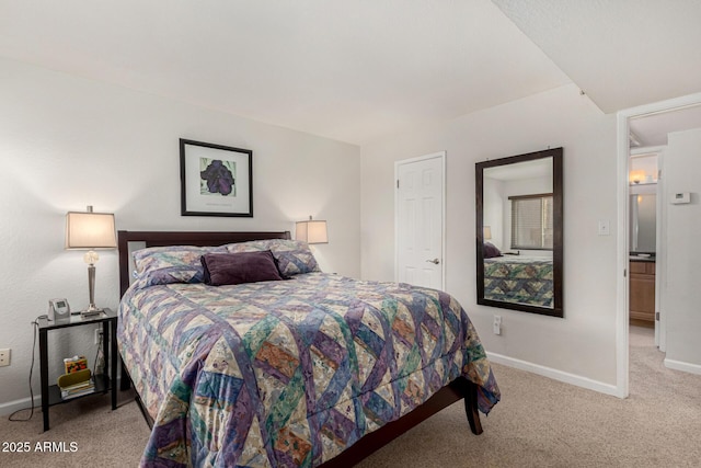 bedroom with light colored carpet