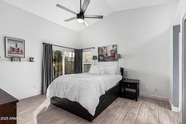 bedroom featuring lofted ceiling, ceiling fan, and light hardwood / wood-style flooring