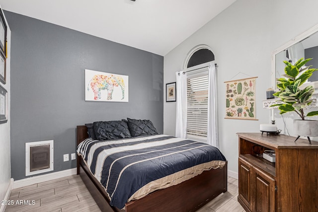 bedroom with vaulted ceiling