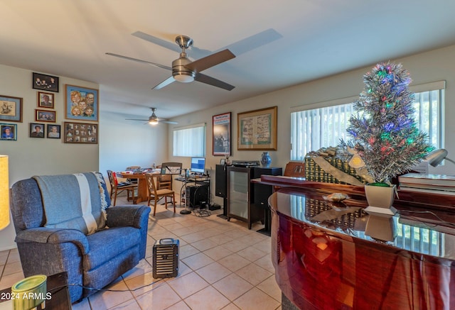 living room with light tile patterned floors and ceiling fan