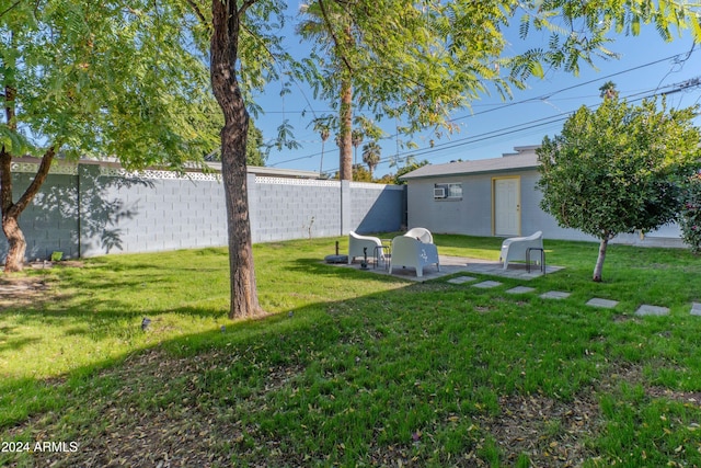view of yard featuring a fenced backyard and a patio