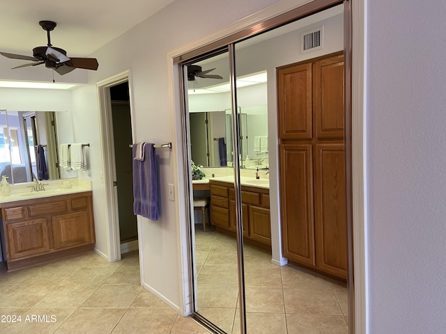 bathroom featuring vanity, tile patterned floors, and ceiling fan