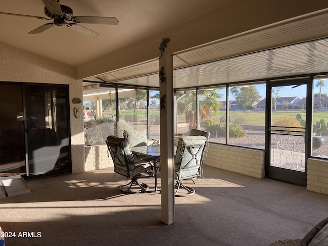 sunroom / solarium with ceiling fan