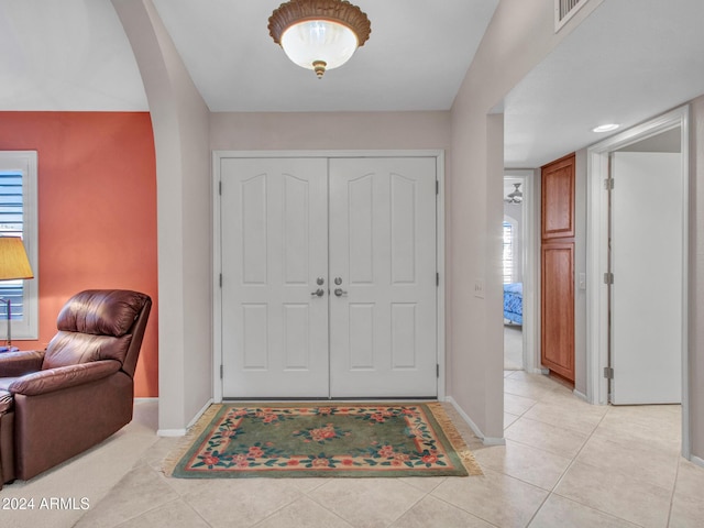 entrance foyer with light tile patterned floors