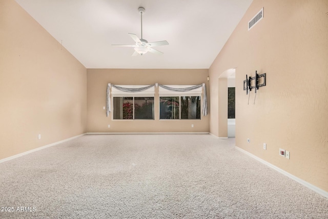 spare room with high vaulted ceiling and ceiling fan