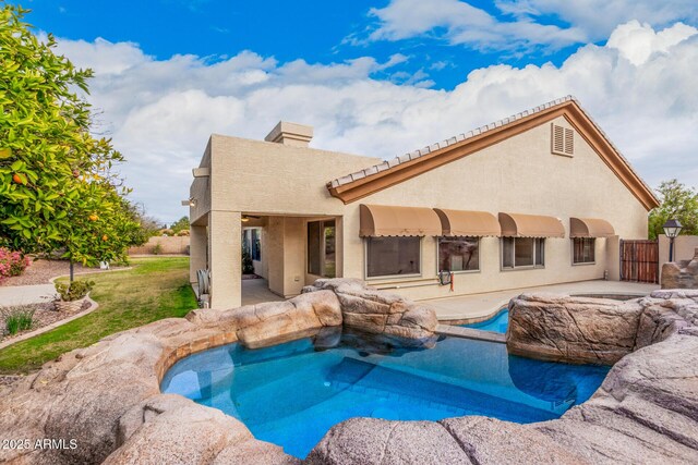 view of pool featuring a patio