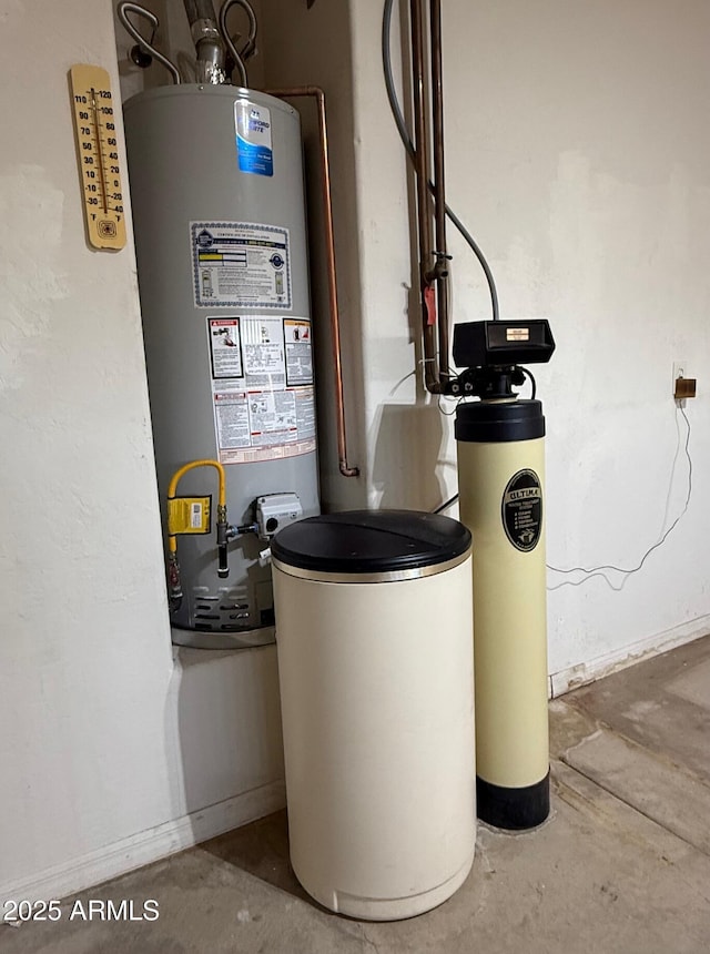 utility room with water heater