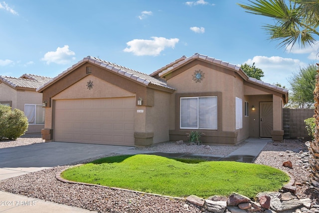 view of front of home with a garage