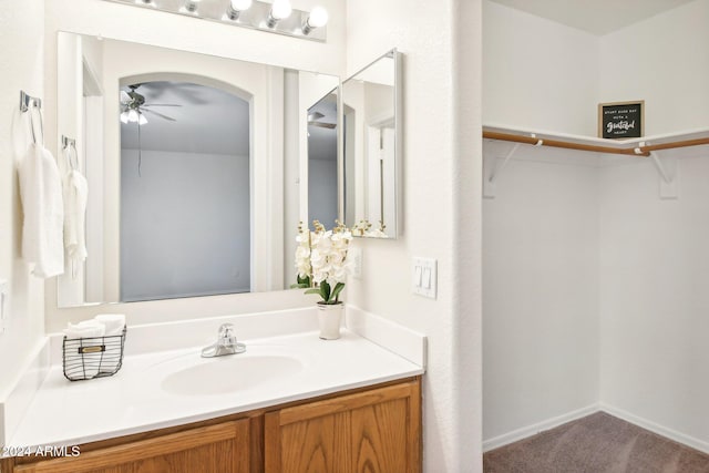 bathroom with vanity and ceiling fan