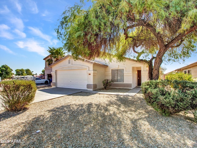 view of front of property featuring a garage