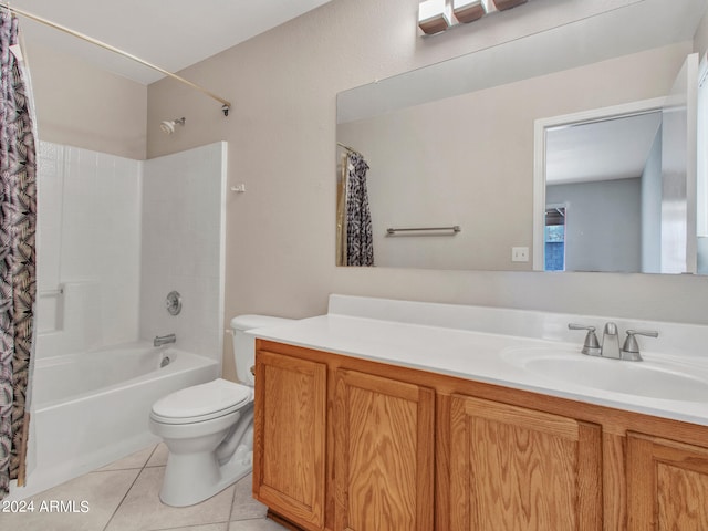 full bathroom featuring tile patterned flooring, vanity, toilet, and shower / bathtub combination with curtain