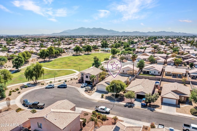 birds eye view of property featuring a mountain view