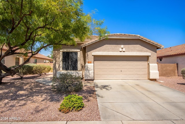 view of front of property with a garage