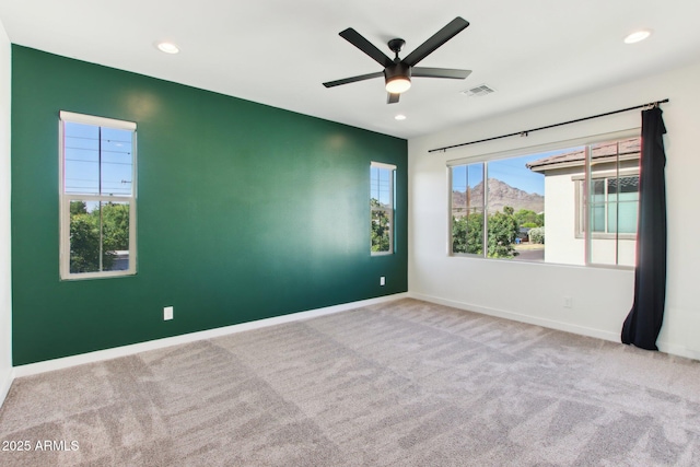 6641 N Desert Shadow Ln, Phoenix, AZ 85014 - empty room featuring a ceiling fan, carpet flooring, baseboards, and recessed lighting