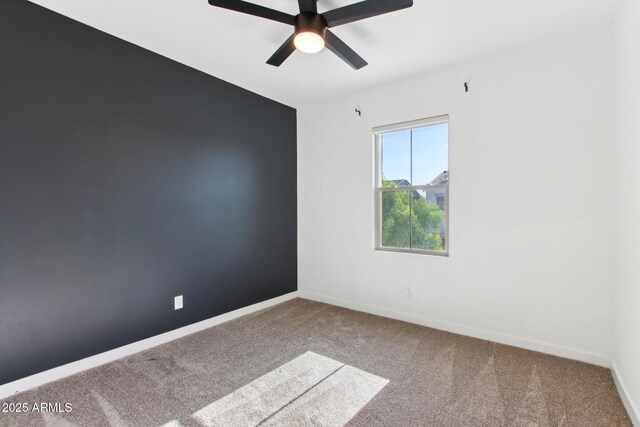 6641 N Desert Shadow Ln, Phoenix, AZ 85014 - empty room with carpet floors, ceiling fan, and baseboards