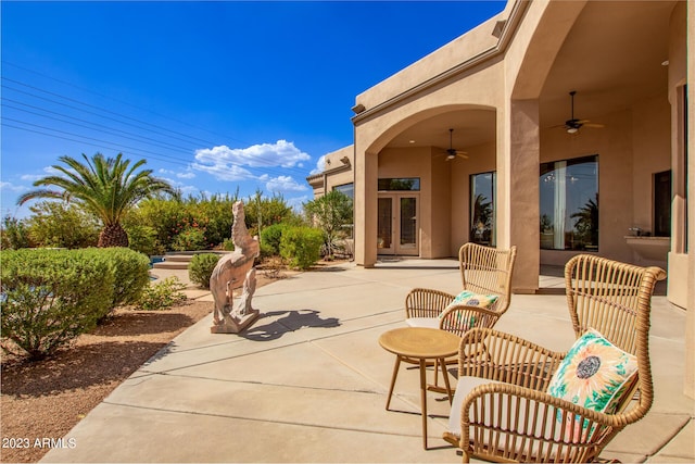 view of patio featuring ceiling fan