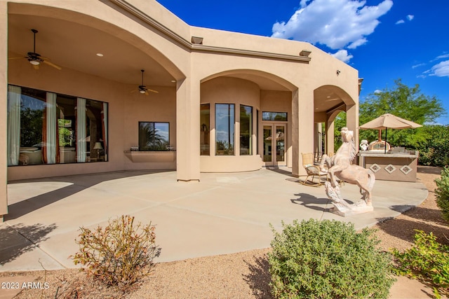 view of patio / terrace featuring ceiling fan and area for grilling