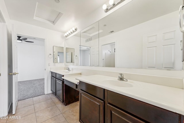 bathroom with tile patterned floors and vanity