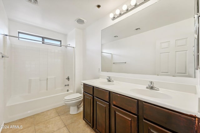 full bathroom with tile patterned flooring, shower / bath combination, vanity, and toilet