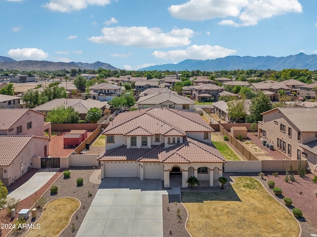 drone / aerial view featuring a mountain view