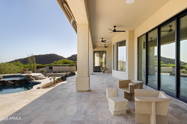 12887 N 135th St, Scottsdale, AZ 85259 - view of patio with a mountain view, ceiling fan, and a pool with connected hot tub