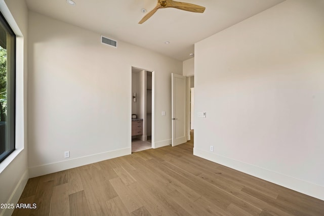 12887 N 135th St, Scottsdale, AZ 85259 - empty room featuring light wood-style floors, a ceiling fan, and recessed lighting