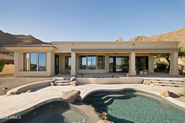 12887 N 135th St, Scottsdale, AZ 85259 - back of house featuring a mountain view, a patio, and stucco siding
