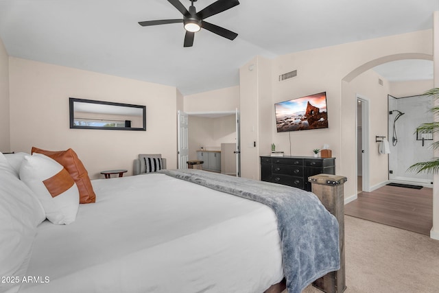 1574 E Scott Ave, Gilbert, AZ 85234 - carpeted bedroom with arched walkways, a ceiling fan, and ensuite bathroom