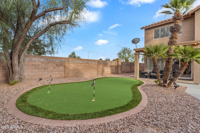 1574 E Scott Ave, Gilbert, AZ 85234 - fenced backyard with an area to practice putting and a patio area