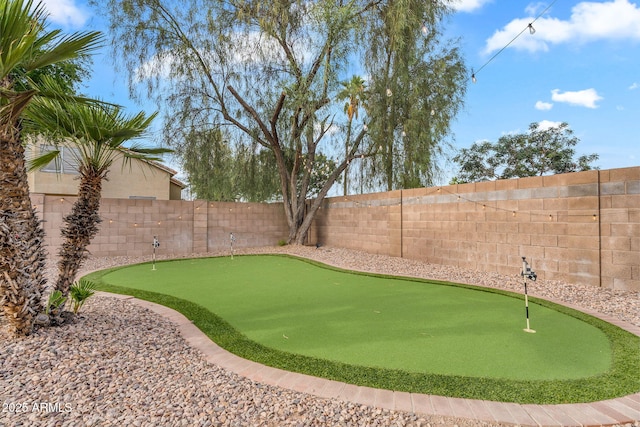1574 E Scott Ave, Gilbert, AZ 85234 - fenced backyard with a putting area