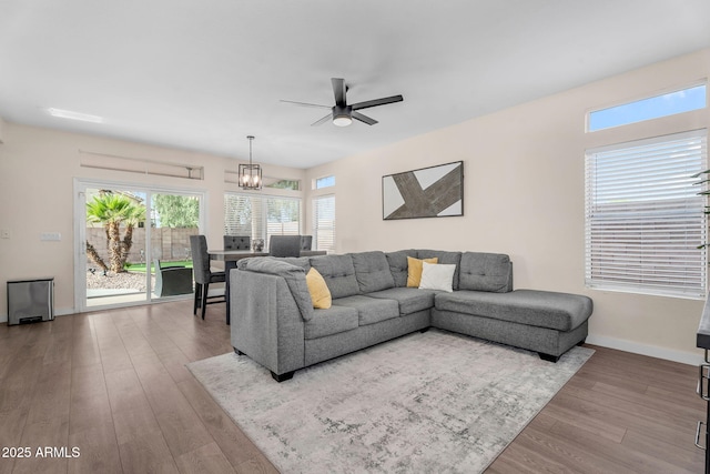 1574 E Scott Ave, Gilbert, AZ 85234 - living area featuring a ceiling fan, wood finished floors, and a chandelier