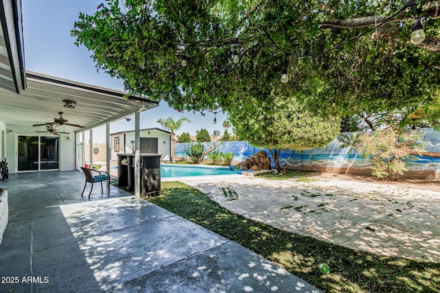 4020 W Anderson Dr, Glendale, AZ 85308 - fenced backyard featuring ceiling fan and a patio