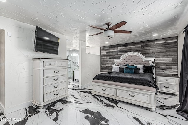 4020 W Anderson Dr, Glendale, AZ 85308 - bedroom featuring baseboards, light marble finish flooring, wood walls, and ceiling fan