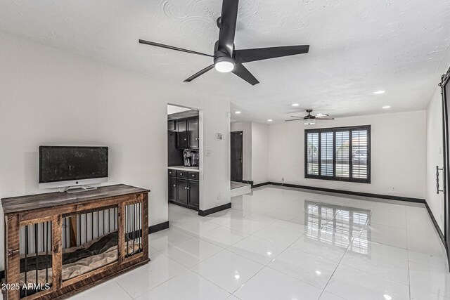 4020 W Anderson Dr, Glendale, AZ 85308 - unfurnished living room with a ceiling fan, light tile patterned floors, baseboards, and recessed lighting