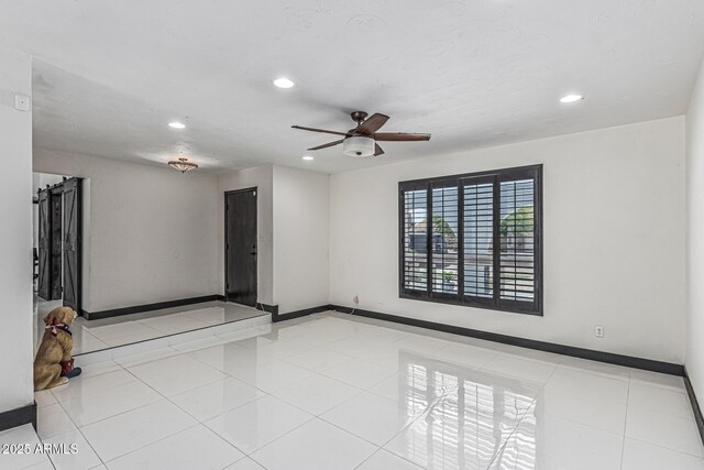 4020 W Anderson Dr, Glendale, AZ 85308 - spare room featuring recessed lighting, tile patterned flooring, ceiling fan, and baseboards