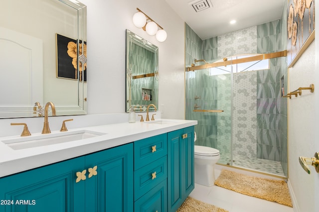 bathroom featuring tile flooring, walk in shower, toilet, and dual vanity