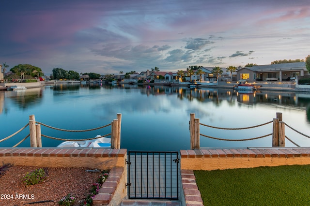 dock area featuring a water view