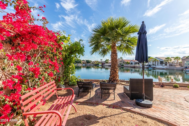 view of patio / terrace with a water view