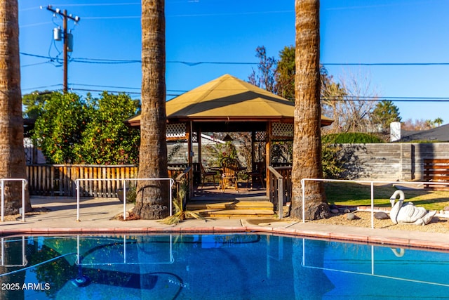 view of swimming pool with a gazebo