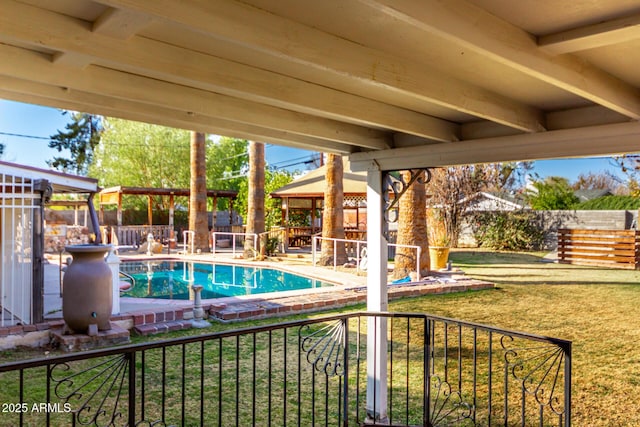 view of pool with a gazebo and a lawn