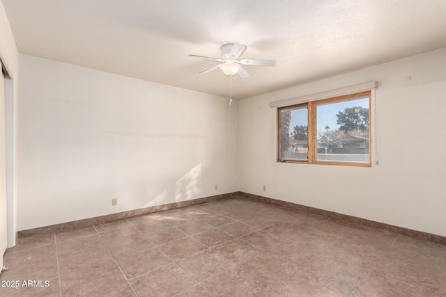 empty room featuring ceiling fan