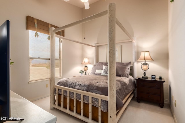 bedroom featuring baseboards and carpet flooring